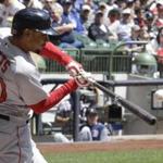 Boston Red Sox's Mookie Betts hits a double during the first inning of a baseball game against the Milwaukee Brewers Thursday, May 11, 2017, in Milwaukee. (AP Photo/Morry Gash)