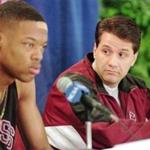 Massachusetts coach John Calipari (right) is seen with Marcus Camby during a press conference before a first round 1996 NCAA Division I Mens Basketball Championship in Providence, R.I., Wednesday, March 13, 1996. (AP Photo/Winslow Townson)