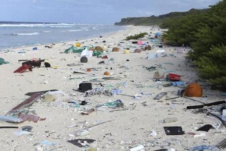 Plastic debris is strewn on the beach on Henderson Island in 2015. 
