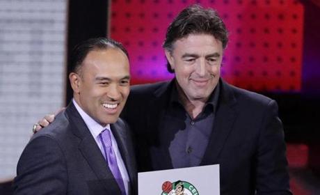 NBA Deputy Commissioner Mark Tatum, left, poses for photographs with Boston Celtics co-owner Wyc Grousbeck, right, after the Celtics won the first pick in the NBA basketball draft, at the draft lottery Tuesday, May 16, 2017, in New York. (AP Photo/Frank Franklin II)
