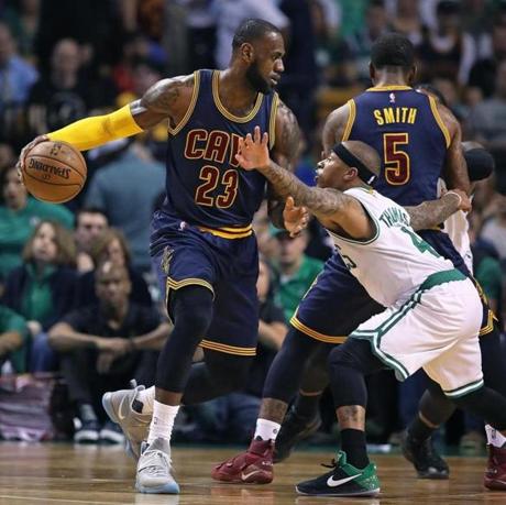 Boston, MA May 17, 2017: The Celtics Isaiah Thomas tries to cover the Cavaliers LeBron James, first quarter action. The Boston Celtics hosted the Cleveland Cavaliers in Game One of the NBA Eastern Conference Finals playoff series at the TD Garden. (Globe Staff Photo/Jim Davis)
