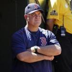 Boston Red Sox manager John Farrell watches from the dugout during a baseball game between the Oakland Athletics and the Red Sox in Oakland, Calif., Saturday, May 20, 2017. (AP Photo/Jeff Chiu)
