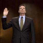 (FILES) This file photo taken on May 03, 2017 shows then FBI Director James Comey being sworn in prior to testifying before the Senate Judiciary Committee on Capitol Hill in Washington, DC. James Comey, the former FBI chief whose firing by President Donald Trump has triggered uproar, has agreed to testify publicly about Russian interference in the 2016 elections, lawmakers announced May 19, 2017. / AFP PHOTO / JIM WATSONJIM WATSON/AFP/Getty Images