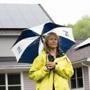 May 25, 2017 - Irene Kneeland poses with the solar panels on the roof of her home in Sutton, Mass. Kneeland expects to have an electric bill at nearly zero this year thanks to the panels. Photo Credit: Justin Saglio for the Boston Globe. Section: Business. Slug: 29solar.