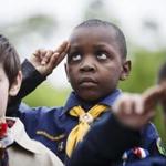 Boston, MA - 5/29/2017 - Cub Scout Miles Gittens, 8, salutes during a Memorial Day parade in Boston, MA, May 29, 2017.(Keith Bedford/Globe Staff)