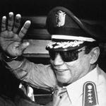 Manuel Noriega waved to reporters in August 1989. Noriega, removed from power later that year after a US military invasion, died Monday. He was 83.