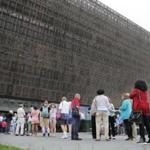 Lucille Simpson, far right, and her daughter Gwendolyn Norman, both from Detroit, Mich., wait in line to enter the Smithsonian National Museum of African American History and Cultural on the National Mall in Washington, Monday, May 1, 2017. The hottest ticket in Washington right now is for the new museum, where thousands of tickets are snapped up each month within minutes of being released, a full seven months after the museum opened. (AP Photo/Pablo Martinez Monsivais)