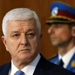 FILE - In this Friday, Feb. 3, 2017 file photo, Montenegro's Prime Minister Dusko Markovic listens to his Serbian counterpart Aleksandar Vucic, not pictured, during a press conference after talks at the Serbia Palace in Belgrade, Serbia. Montenegro's prime minister has called Russia's expulsion of a Montenegrin official 