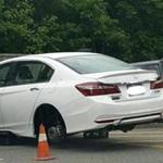 One of three Honda Accords in Stoneham recently stripped of its tires and wheels.  
