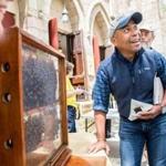 Former governor Deval Patrick examined a hive during the Langstroth Bee Fest held at the Second Congregational Church in Greenfield.