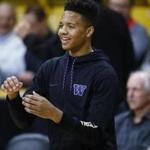 Washington guard Markelle Fultz looks for a pass from a teammate as they warm up before facing Colorado in an NCAA college basketball game Thursday, Feb. 9, 2017, in Boulder, Colo. Fultz, projected as a top pick in this year's NBA draft, is siting out the game. (AP Photo/David Zalubowski)