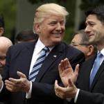 President Donald Trump spoke with House Speaker Paul Ryan during a ceremony in the Rose Garden of the White House after the House pushed through a health care bill in May. 