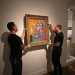 In March, Sean Cooper (left) and Bob Farrell hung works for a Matisse exhibit at the Museum of Fine Arts.