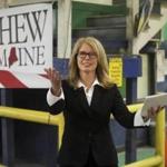 Former Maine Health and Human Commissioner Mary Mayhew arrives at Dingley Press to announce she's running for governor, Tuesday, June 6, 2017, in Lisbon, Maine. She vowed to fight a defeatist attitude in state government and to continue changes she helped implement in the administration of Republican Gov. Paul LePage. (AP Photo/Robert F. Bukaty)