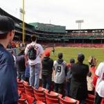 Boston-04/03/2017- Opening Day at Fenway Park- Red Sox played the Pirates- Fans in right field wait for long fly ball during batting practice. John Tlumacki/Globe staff(sports)