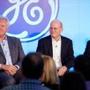 Outgoing General Electric CEO Jeff Immelt (left), successor John Flannery, and Jack Brennan, the lead independent director of the GE board, at a press conference on Monday.