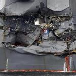 Damage to the guided missile destroyer USS Fitzgerald is seen as the vessel is berthed at its mother port in Yokosuka, southwest of Tokyo, on June 18, 2017. The bodies of US sailors missing after their destroyer collided with a container ship off Japan have been found in flooded sleeping berths, a day after the accident tore a huge gash in the warship's side, the US Navy said on June 18. / AFP PHOTO / Kazuhiro NOGIKAZUHIRO NOGI/AFP/Getty Images
