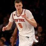 NEW YORK, NY - MARCH 27: Kristaps Porzingis #6 of the New York Knicks celebrates his basket in the first quarter against the Detroit Pistons at Madison Square Garden on March 27, 2017 in New York City. NOTE TO USER: User expressly acknowledges and agrees that, by downloading and or using this Photograph, user is consenting to the terms and conditions of the Getty Images License Agreement (Photo by Elsa/Getty Images)