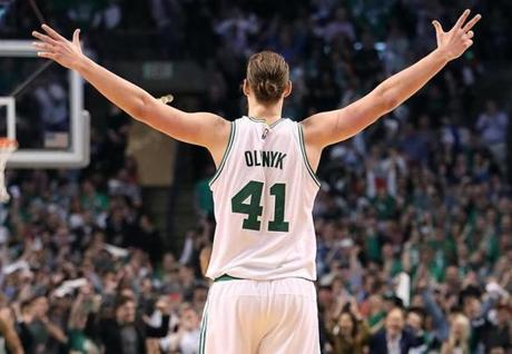 Boston MA 4/26/17 Boston Celtics Kelly Olynyk reacting after teammate Al Horford's break away slam dunk against the Chicago Bulls during fourth quarter action of game 5 of the NBA Playoffs at TD Garden. (Photo by Matthew J. Lee/Globe staff) topic: reporter: 
