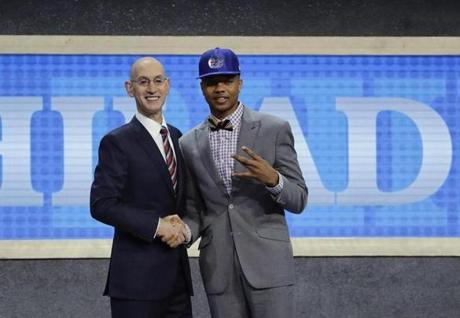 Washington's Markelle Fultz, right, poses for a photo with NBA Commissioner Adam Silver after being selected by the Philadelphia 76ers as the No. 1 pick overall during the NBA basketball draft, Thursday, June 22, 2017, in New York. (AP Photo/Frank Franklin II)
