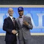 Washington's Markelle Fultz, right, poses for a photo with NBA Commissioner Adam Silver after being selected by the Philadelphia 76ers as the No. 1 pick overall during the NBA basketball draft, Thursday, June 22, 2017, in New York. (AP Photo/Frank Franklin II)