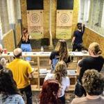 Indoor competitive ax throwing at Urban Axes. 