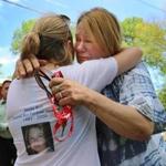 Magi Bish (right), mother of Molly Bish, cried as she hugged Sarah Stein, a private investigator who headed a new search for clues in the girl?s murder. 