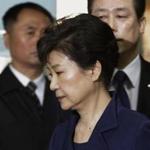FILE - In this March 30, 2017 file photo, former South Korean President Park Geun-hye arrives at the Seoul Central District Court for hearing on a prosecutors' request for her arrest for corruption, in Seoul, South Korea. North Korea on Wednesday, June 28, 2017, vowed to execute South Korea's former president and her spy director, accusing them of planning to assassinate its supreme leadership, according to the official Korean Central News Agency reporting North Korea will impose a 