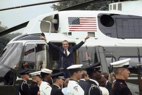 09 Aug 1974, Washington, DC, USA --- As he boards the White House helicopter after resigning the presidency, Richard M. Nixon smiles and gives the victory sign. --- Image by Â© Bettmann/CORBIS -- 11crit
