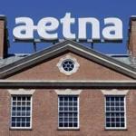 This Aug. 19, 2014, file photo, shows corporate signage at Aetna headquarters in Hartford, Conn. Hartford's Mayor Luke Bronin said Wednesday, May 31, 2017, that he believes Aetna is planning to move its headquarters out of Connecticut. The mayor released a statement saying that he has had multiple conversations with senior leaders at the insurance giant and believes the company decided a long time ago to relocate their corporate headquarters. (AP Photo/Jessica Hill, File)