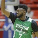 Boston Celtics forward Jaylen Brown (7) celebrates after scoring a 3-pointer against the Philadelphia 76ers during the first half of an NBA summer league basketball game Monday, July 3, 2017, in Salt Lake City. (AP Photo/Rick Bowmer)