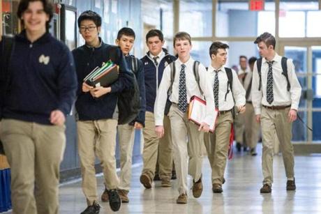 Students walked the halls between classes at Malden Catholic High School.
