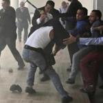 Opposition lawmakers brawl with progovernment militias who tried to force their way into the National Assembly.