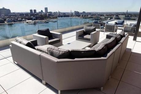 The Eddy is a luxury apartment building that has a view of the Boston skyline from the roof deck. 
