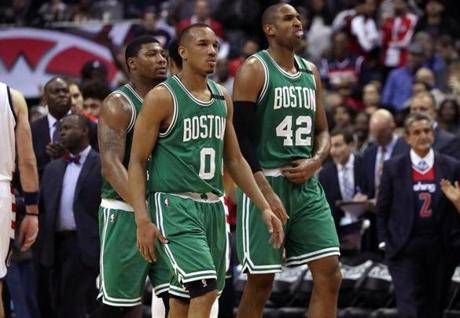 Washington, D.C. - 5/12/2017 - (4th quarter) Boston Celtics guard Avery Bradley (0), Boston Celtics center Al Horford (42), and Boston Celtics guard Marcus Smart (36) head to the bench for a timeout and the score tied at 87-87 in the fourth quarter. The Washington Wizards host the Boston Celtics in Game 6 of the Eastern Conference Semi-Finals at the Verizon Center in Washington, D.C. - (Barry Chin/Globe Staff), Section: Sports, Reporter: Adam Himmelsbach, Topic: 13Celtics-Wizards, LOID: 8.3.2455943579.
