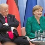 United States President Donald Trump, left, and German Chancellor Angela Merkel take part in a Women and Development event at the G20 summit Saturday, July 8, 2017 in Hamburg, Germany. (Ryan Remiorz/The Canadian Press via AP)
