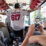 Duck boat tour guide Shawn-Paul Filtranti showed off his nickname, Supah Fan, embroidered on his uniform.