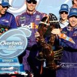 LOUDON, NH - JULY 16: Denny Hamlin, driver of the #11 FedEx Office Toyota, poses with a lobster in Victory Lane after winning the Monster Energy NASCAR Cup Series Overton's 301 at New Hampshire Motor Speedway on July 16, 2017 in Loudon, New Hampshire. (Photo by Jeff Zelevansky/Getty Images)