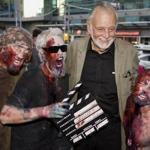 Mr. Romero posed with fans dressed as zombies at the Toronto International Film Festival in 2009.