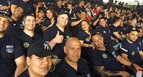 NYPD officers, wearing T-shirts that honored their murdered colleague Officer Miosotis Familia, attended Sunday night?s Red Sox-Yankees game at Fenway Park.
