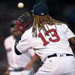 Boston, MA: July 18, 2017: Red Sox starting pitcher Brian Johnson got himself out of a bases loaded two out jam in the top of te second when he leapt for a high chopper off the bat of the Toronto's Russell Martin and tossed the ball to first baseman Hanley Ramirez (13) to end the threat. The Boston Red Sox hosted the Toronto Blue Jays in a regular season MLB baseball game at Fenway Park. (Jim Davis/Globe Staff)