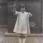 Charlotte Fellman at 8, when she conducted the rhythmic orchestra at Symphony Hall.