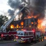 Fire officials were still searching Monday for the cause of an 8-alarm blaze in Waltham Sunday. 