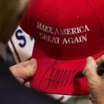 Donald Trump signed a campaign hat after speaking at a rally at the Connecticut Convention Center in April 2016.