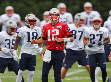 Foxborough -07/27/2017- The Patriots held their first day of traing camp at the practice field of Gillette Stadium. Tom Brady smiles as he works out with the team. John Tlumacki/Globe staff(sports)
