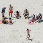 Governor Chris Christie of New Jersey (right) was seen lounging on a closed state beach July 2, during the state?s government shutdown.