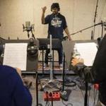 Boston, MA - 7/25/2017 - Composer Navneeth Narasimhan conducts singers during a recording session to score the music for a video game at the Berklee College of Music in Boston, MA, July 25, 2017. (Keith Bedford/Globe Staff)