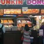 Boston, MA - 08/10/15 - The state's deal to privatise operations and maintenance at Back Bay Station is off to a bumpy start. Customers line up for one of two Dunkin' Donuts stalls inside the station. Lane Turner/Globe Staff Section: BIZ Reporter: coffers Slug: 11backbay