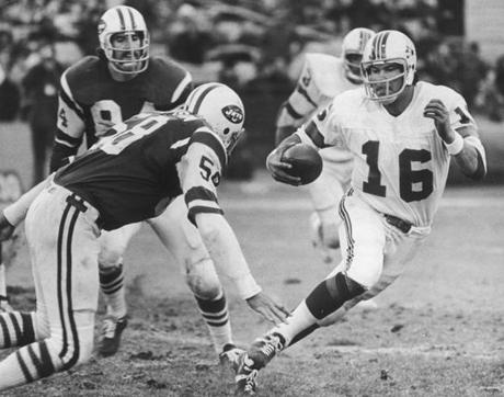 Patriots quarterback Jim Plunkett, just before getting hit in a game against the Jets in 1973.
