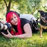 Kaylee Greer, of Melrose, with dogs at Boston?s Public Garden. She runs a pet photography business named Dog Breath Photography.